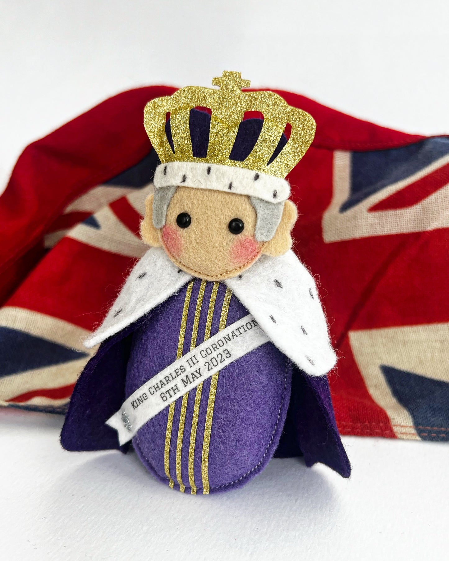 King Charles with Coronation Banner