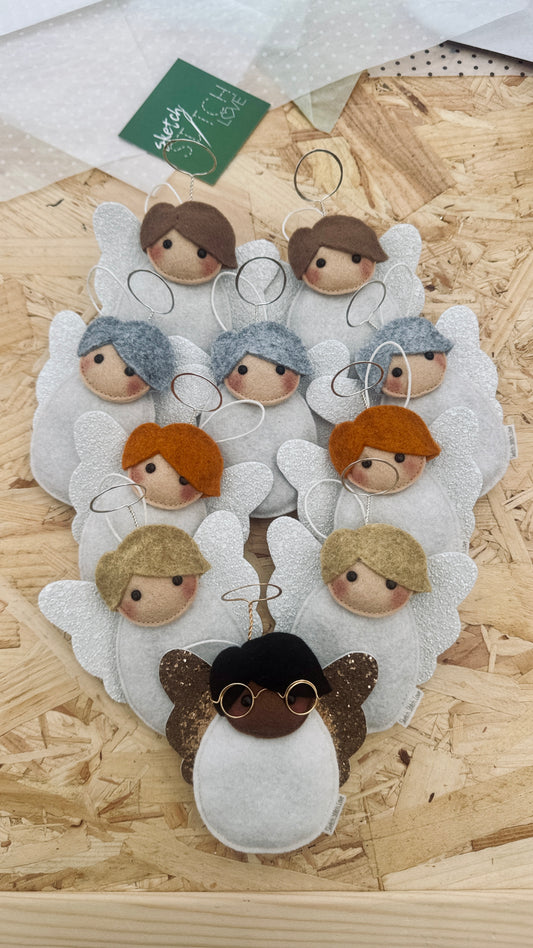 Frosted White Angels and Ivory Gold Angels (sold as seen)