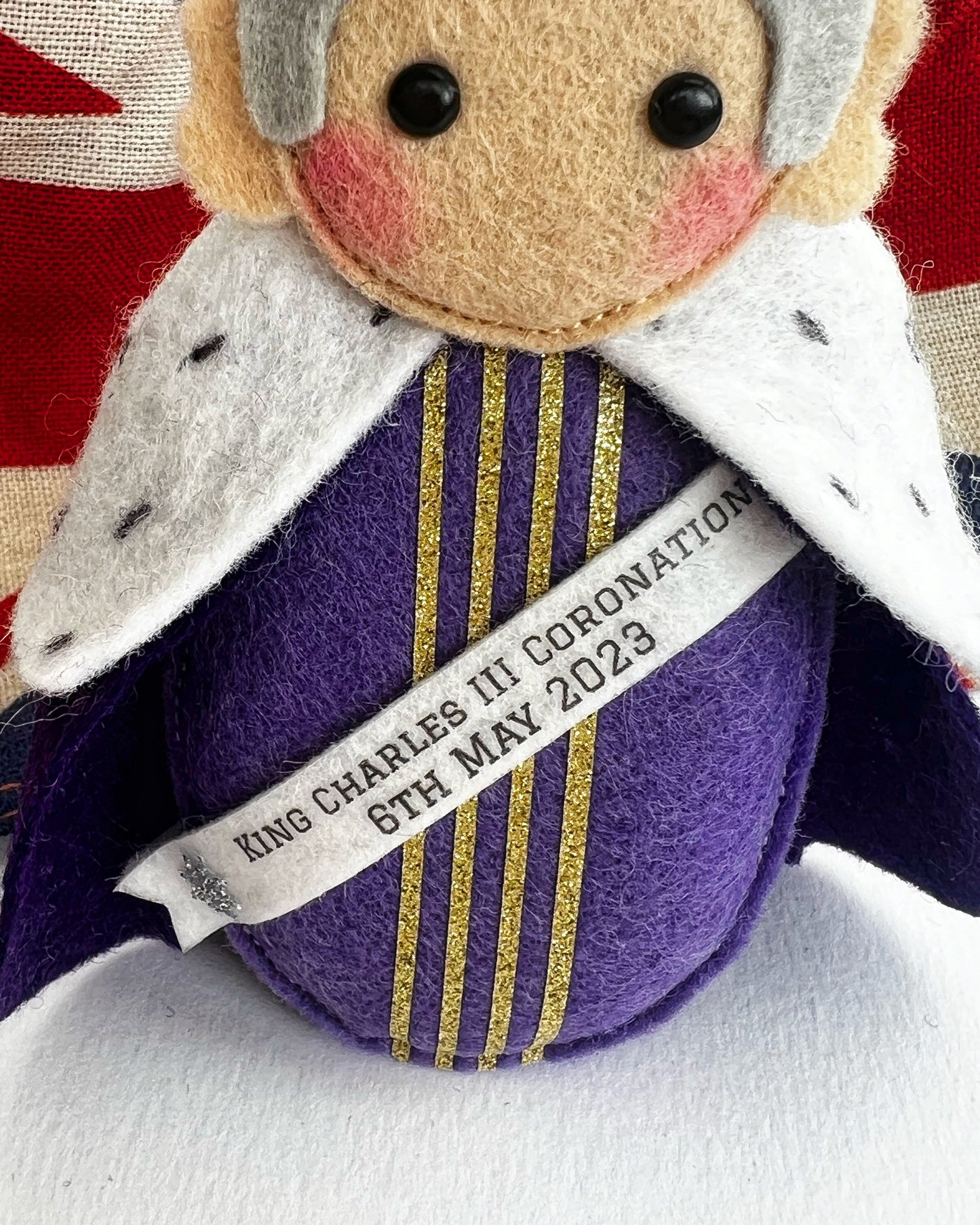 King Charles with Coronation Banner