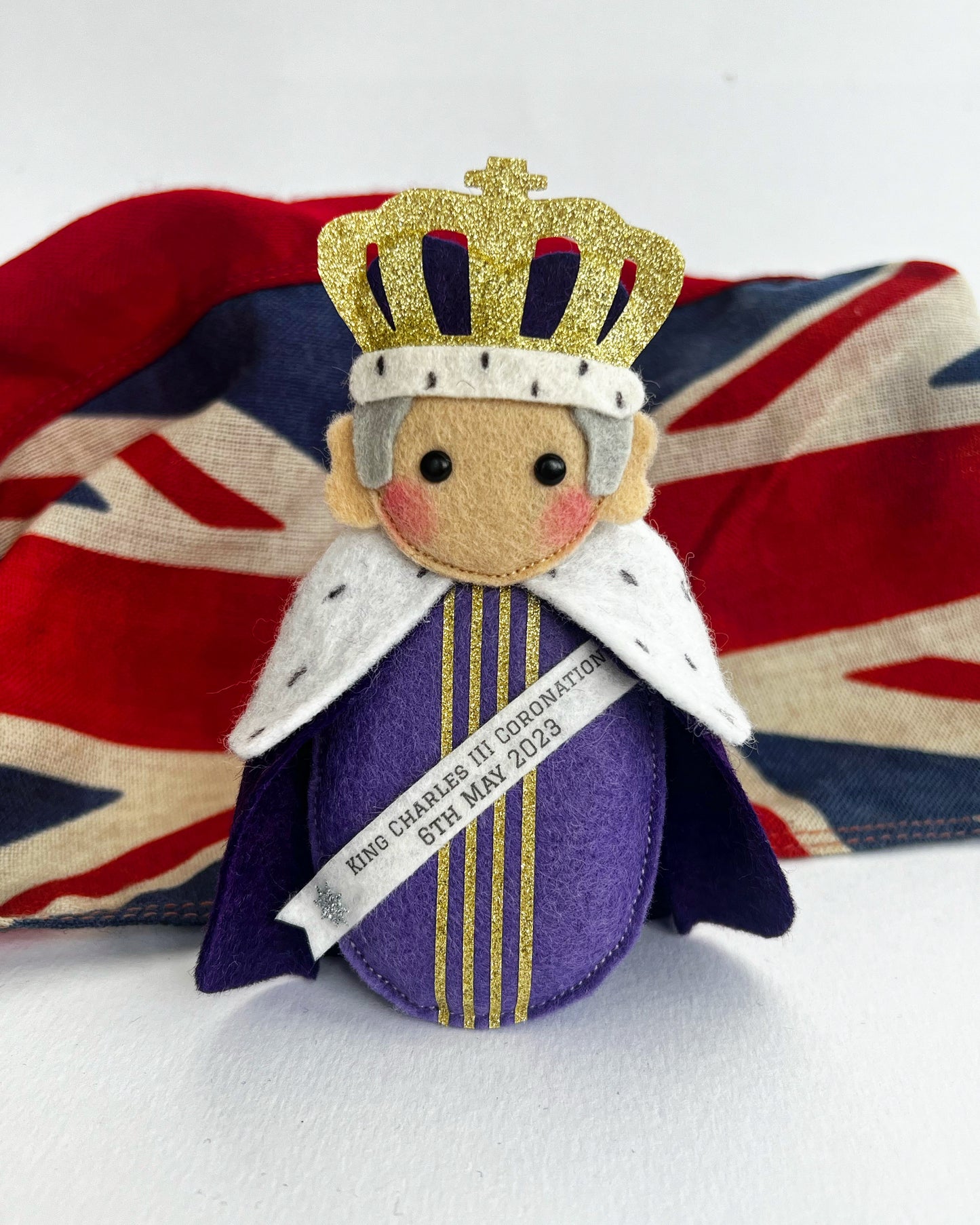 King Charles with Coronation Banner