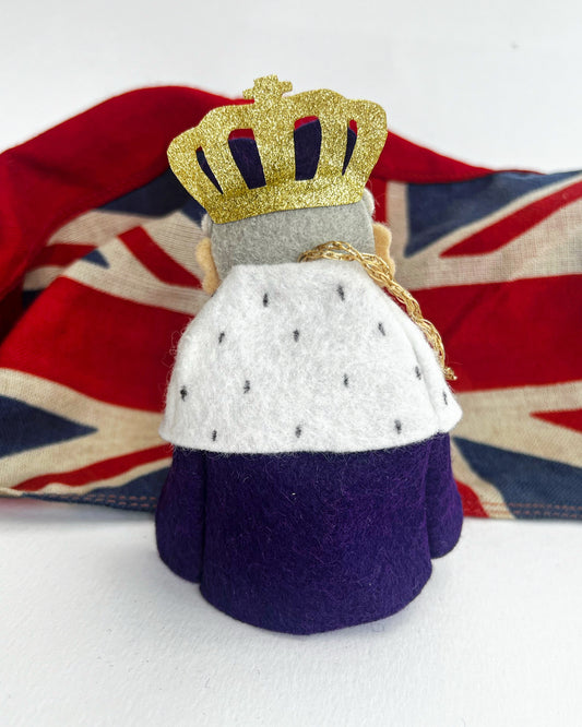 King Charles with Coronation Banner